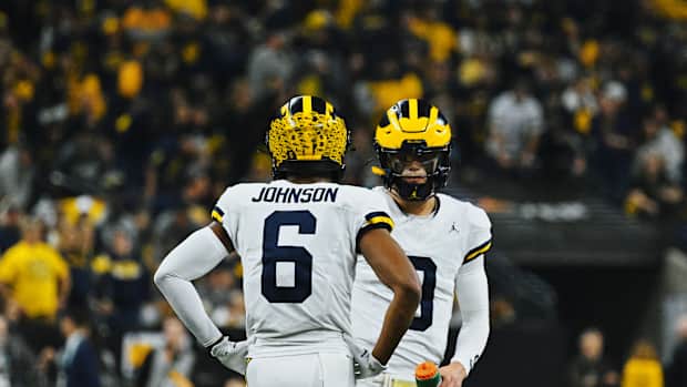 JJ McCarthy, Cornelius Johnson